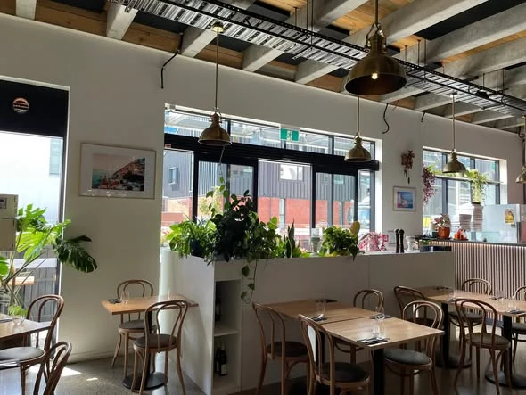 Bright restaurant interior after commercial glass cleaning