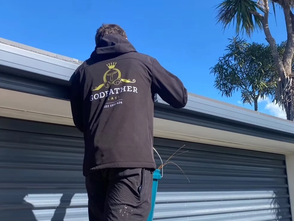 Godfather Glass technician working in branded uniform